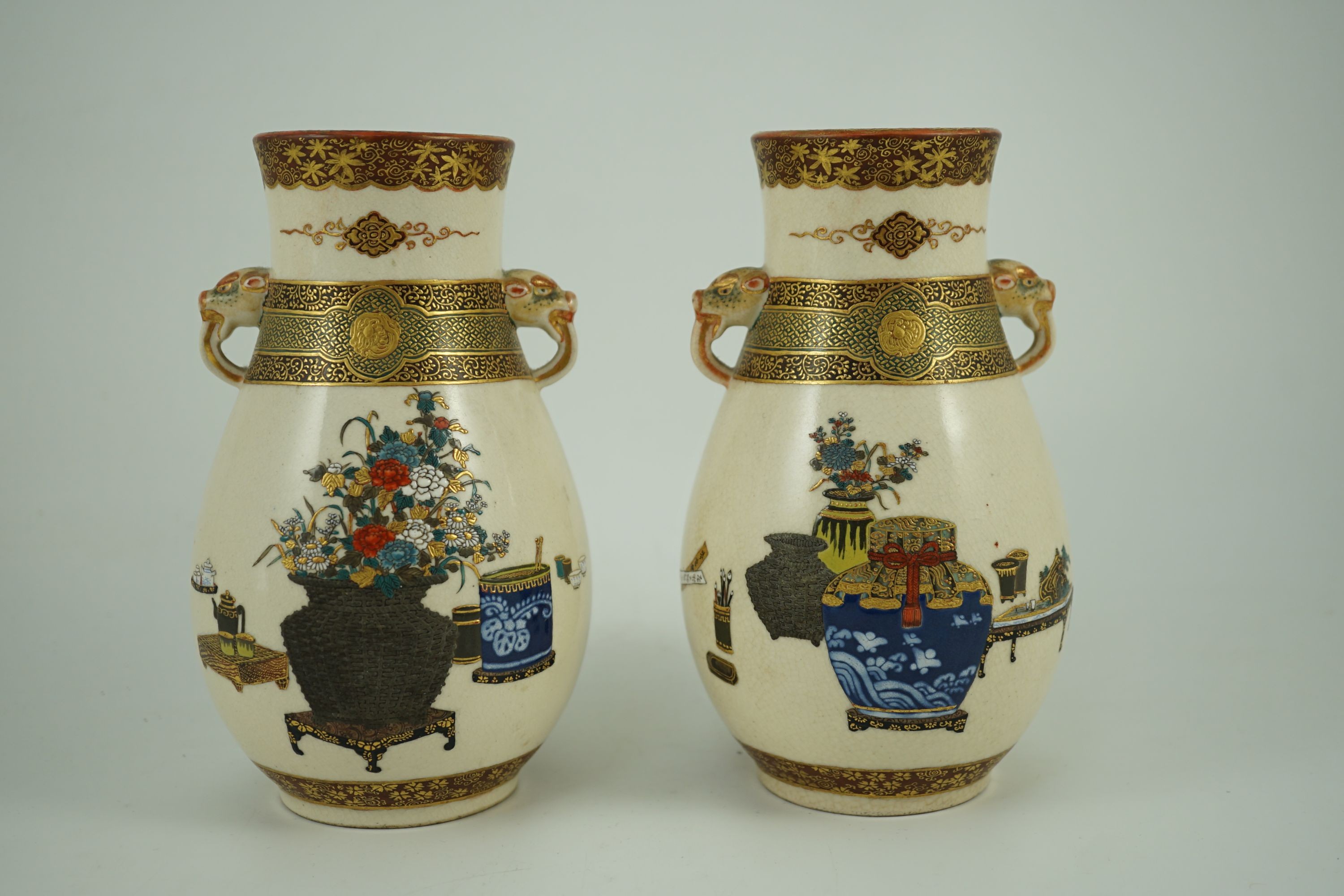 A pair of Japanese Satsuma pottery vases, by Bizan, Meiji period, 18.2cm high